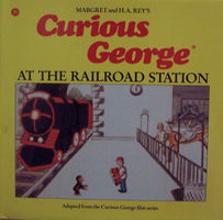Curious George at the railroad station
